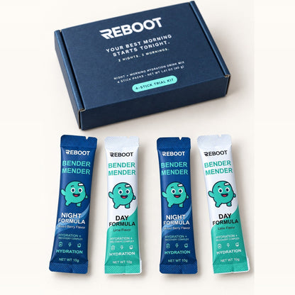 The four sticks inside the Reboot Trial Pack: two NIGHT Mixed Berry and two DAY Lime, laid out in front of the open box